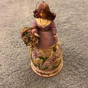 Small October angel. Purple top and flowered dress.